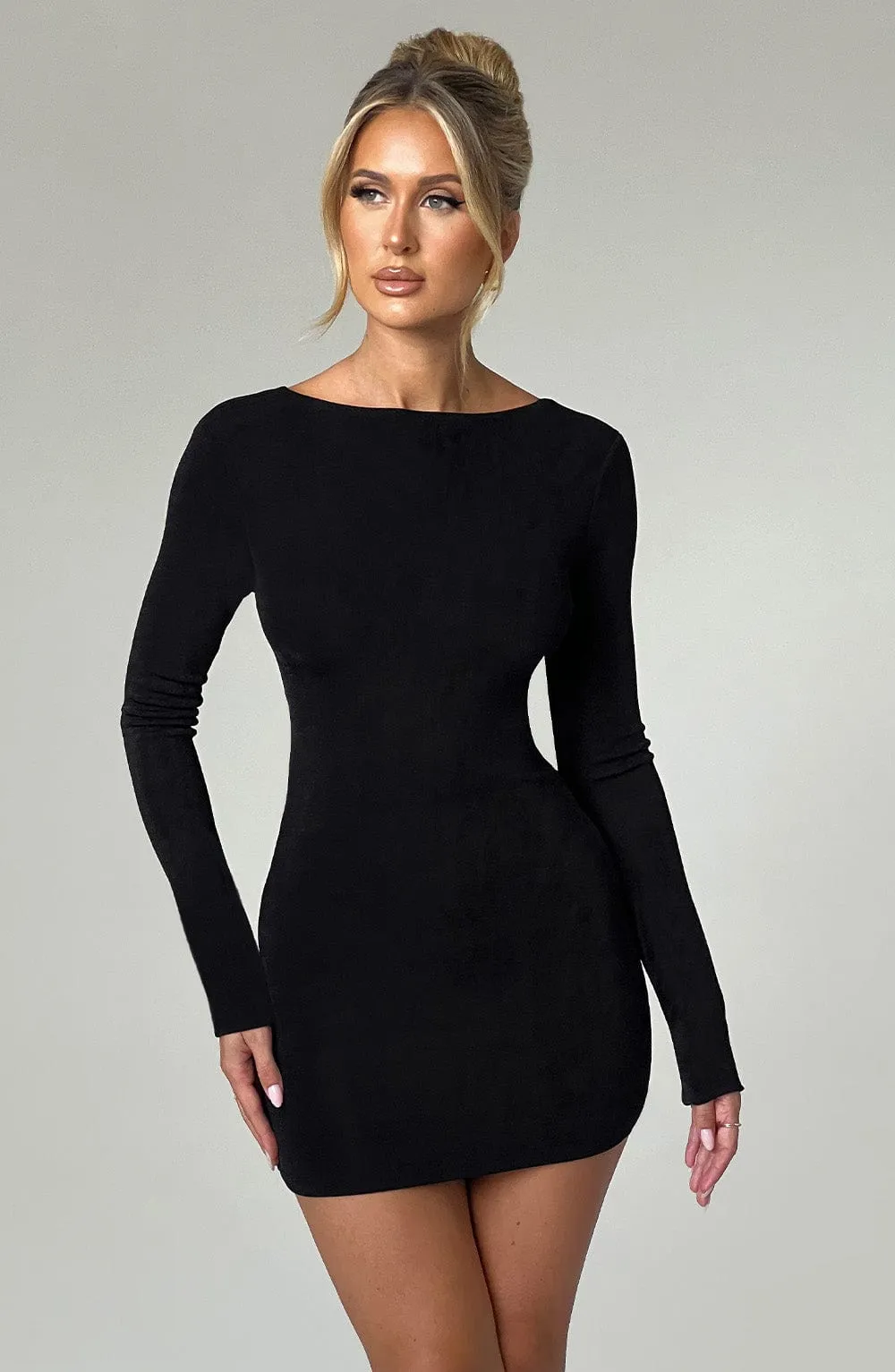 Una Mini Dress Black dari MARIOBOLA dengan desain high shine jersey bodycon