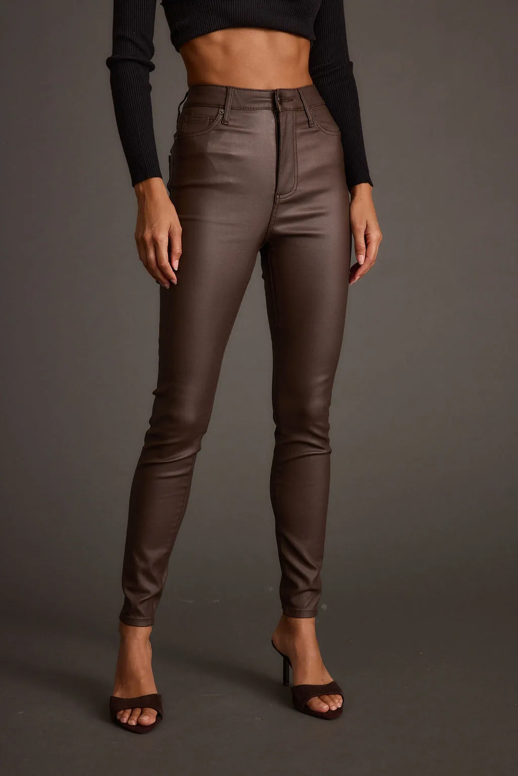 Tampilan depan HAJAR88 Nixon Mocha Coated Pants warna coklat elegan untuk wanita